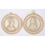 Pair of good quality circular carved ivory relief plaques