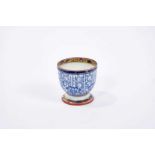 Rare Caughley egg cup, circa 1785, painted in blue with the Lily pattern, gilt highlights, enamel pa