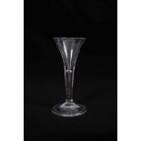 Georgian wine glass, the trumpet bowl on a plain stem with teardrop inclusion, above a conical foot,