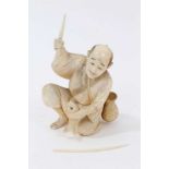 Early 20th century Japanese carved ivory okimono of a fisherman