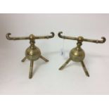 Pair of Victorian brass fire dogs to a design by Christopher Dresser,