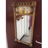 Regency giltwood pier mirror with verre eglomise panel