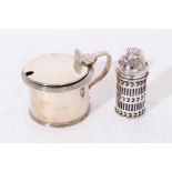 Silver mustard pot and a silver pepper pot