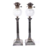 Impressive pair of late 19th century silver plated oil lamps with cut glass reservoir