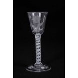 Georgian wine glass, the round funnel bowl engraved with a flower, on a double series opaque twist s