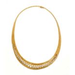 Diamond and 18ct gold necklace, the graduated collar with articulated beaded gold links and 34 gradu