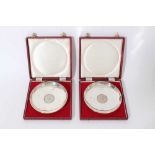 Pair of cased silver Winston Churchill dishes