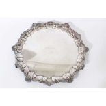Late Victorian silver salver with engraved inscription and pie crust border.