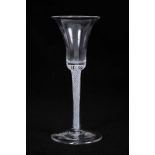 Georgian wine glass, with a bell-shaped bowl on a single series spiral gauze opaque twist stem, abov