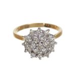 Diamond cluster ring with a round cluster of 19 brilliant cut diamonds in tiered claw setting on 18c