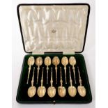 Set of 12 silver gilt teaspoons in fitted case