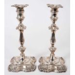 Good pair of George II style silver candlesticks, London 1907