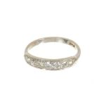 Diamond seven stone half hoop ring