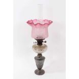 Fine quality silver plated cut glass oil lamp of classical form with ruby glass shade and clear funn