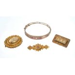 Late Victorian diamond and ruby hinged bangle and three Victorian brooches