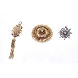 19th century yellow metal circular filigree brooch, Victorian three colour gold fob with tassel drop