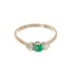 Emerald and diamond three stone ring