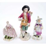 19th century Chelsea style figure of a rabbit seller, together with two further Continental porcelai