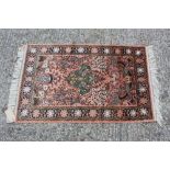 Two modern part silk Persian design rugs