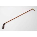 Yellow metal-mounted riding crop by Swaine and Aderney, London