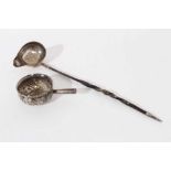 18th century silver toddy ladle together with another (lacking handle)