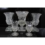Five 19th century cut glass vases, including two pairs and one larger example, all of goblet form, t