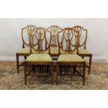 Set of six George III 'country Chippendale' fruitwood dining chairs, each with arched toprail and p