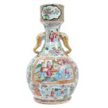 19th century Chinese Canton famille rose garlic form porcelain bottle vase, with elephant mask handl