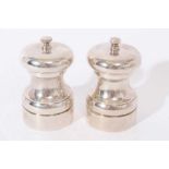 Pair contemporary silver salt and pepper mills.