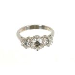 Diamond three stone ring with three round brilliant cut diamonds, the central diamond estimated to w