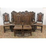 Harlequin set of eleven late Victorian Carolean revival carved oak dining chairs with brown leather