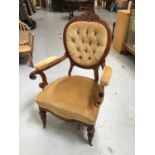 Victorian mahogany framed armchair with upholstered seat, back and arms, on turned front legs