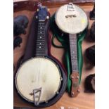 Two banjos with cases