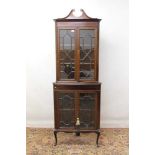 Edwardian two height glazed standing corner cupboard