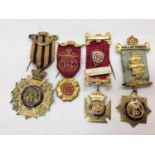 Silver gilt Order of Buffalos medal and three other Masonic medals