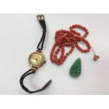 Vintage 9ct gold wristwatch, antique coral necklace and carved green hardstone pendant
