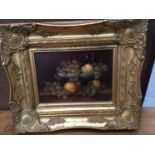 Pair of Continental school oils on panel - still life of fruit, indistinctly signed, in gilt frames