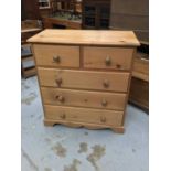 Pine chest of two short and three long drawers