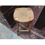 Set of four bar/kitchen stools with rush seats, another stool and a tiled top occasional table
