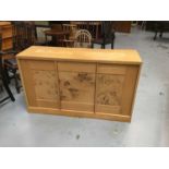 Contemporary light oak sideboard with three panelled doors