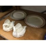 Two Victorian Wedgwood creamware plates and a pair of creamware swans