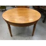 Extending dining table together with a set of four chairs