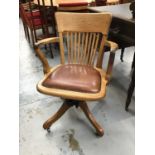 1930s oak and leather swivel desk chair