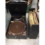 HMV portable gramophone and old records