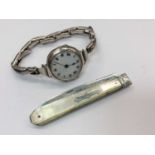Silver cased wristwatch on expandable sterling silver bracelet, together with a silver and mother of
