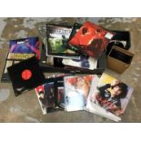 Selection of vinyl records including LPs, 12" singles and 7" singles