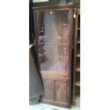 Antique mahogany shop's narrow display cabinet