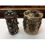 Two Eastern white metal gem set canisters