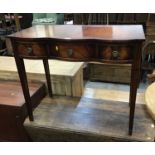 Reproduction mahogany serpentine fronted side table with three drawers