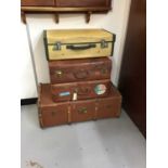 Antique canvas trunk and lot suitcases